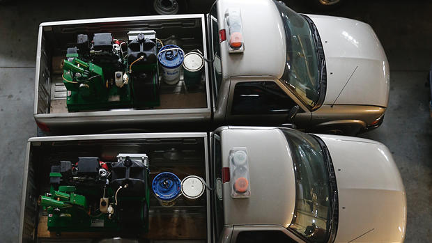 Trucks sit at the ready at Grand Forks Mosquito Control. Jesse Trelstad Grand Forks Herald