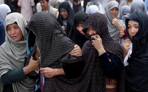 Afghanistan held a national day of mourning on Sunday a day after a suicide bomber killed at least 80 people who were taking