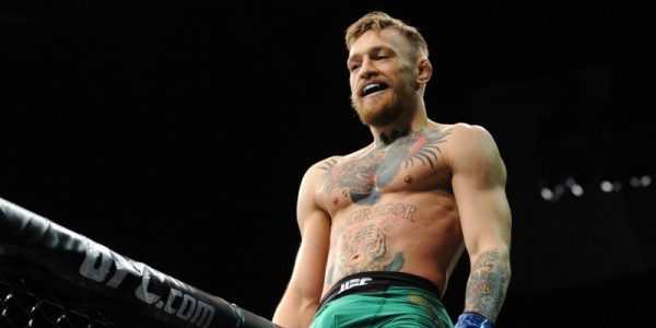 Conor Mc Gregor celebrates his championship victory against Jose Aldo during UFC 194 at MGM Grand Garden Arena