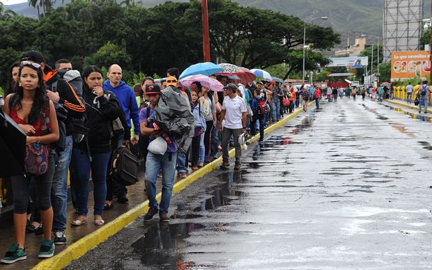 Venezuelans cross the Simon Bolivar bridge linking San Antonio del Tachira in Venezuela with Cucuta Colombia to buy basic supplies