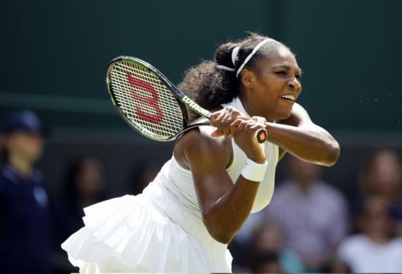 Serena Williams returns to Annika Beck of Germany