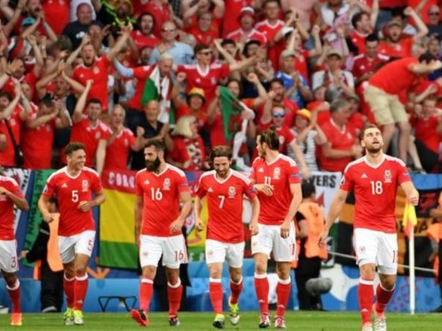 Wales team celebrate win. They had not played at a major tournament finals since 1958./COURTESY