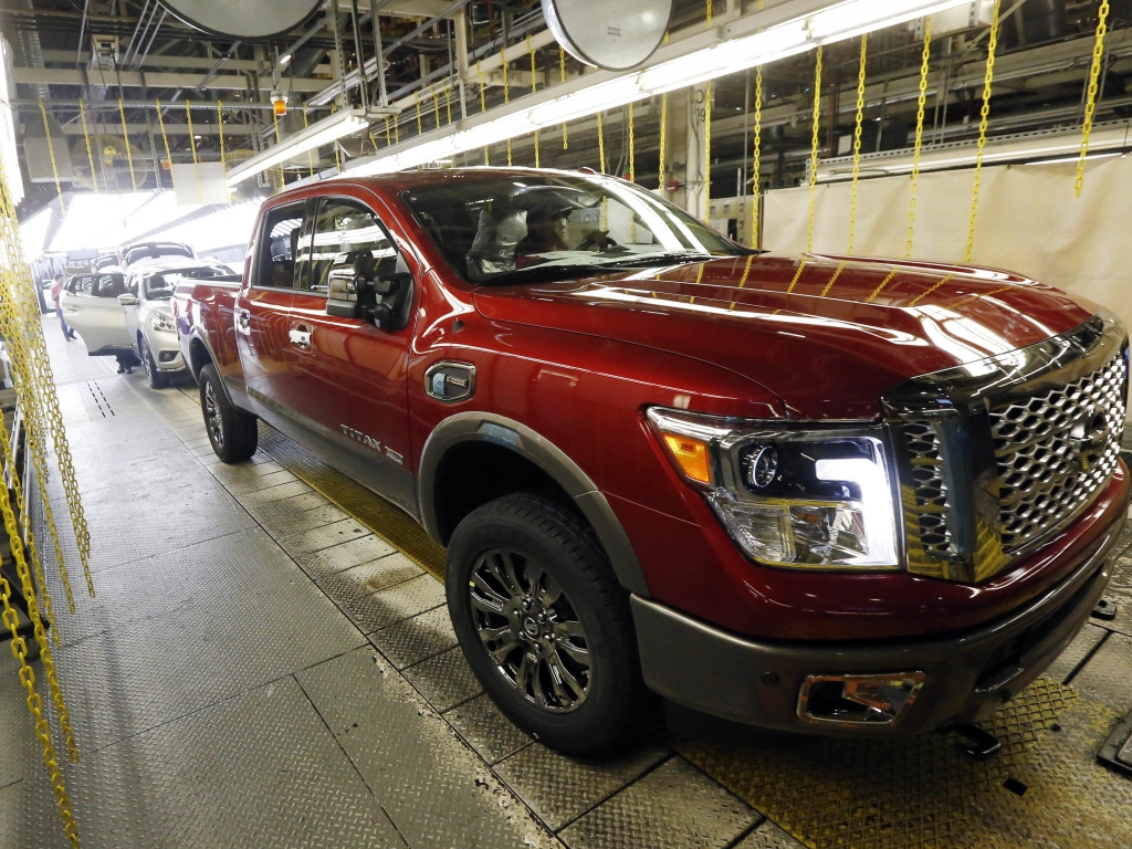 A Nissan Titan rolls off the line in Canton Miss. in April. Truck and SUV sales were strong again in July.   Rogelio V. Solis    
  AP