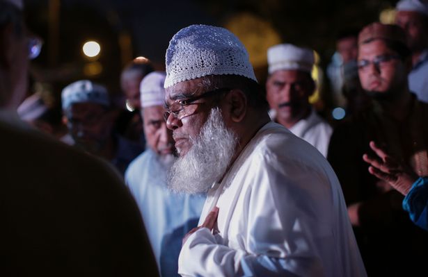 AFP
A community member speaks with members of the media outside the Al Furqan Jame Mosque