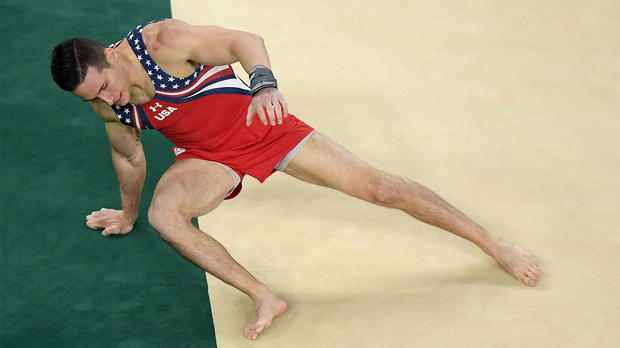 Alexander Naddour steps out of bounds during the men's gymnastics team final.                     Getty Images