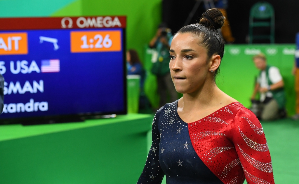 Aug 7 2016 Rio de Janeiro Brazil Aly Raisman performs the balance beam during women's gymnastic qualifications in the Rio 2016 Summer Olympic Games at Rio Olympic Arena. Mandatory Credit Robert Deutsch-USA TODAY Sports ORG XMIT USATSI-GRP