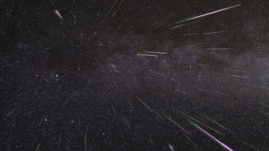 An outburst of Perseid meteors lights up the sky in August 2009 in this time-lapse image. Stargazers expect a similar outburst during next week’s Perseid meteor shower which will be visible overnight on Aug. 11 and 12