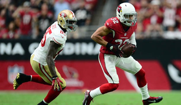 Sep 27 2015 Glendale AZ USA Arizona Cardinals free safety Tyrann Mathieu intercepts a pass intended for San Francisco 49ers tight end Vernon Davis during the first half at University of Phoenix Stadium