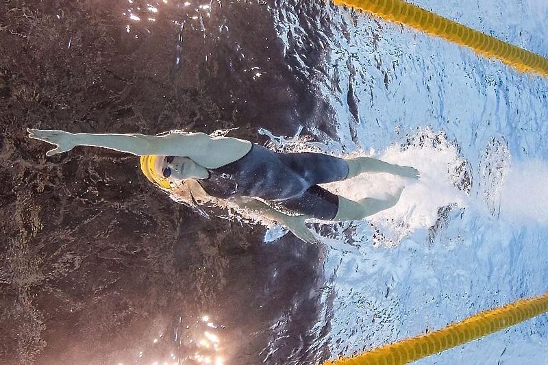 Cate Campbell reaching for Australia's second gold of the day in Rio- by Patrick B. Kraemer