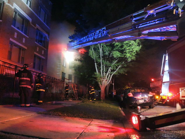 Chicago firefighters battle an apartment fire in South Chicago early on Tuesday