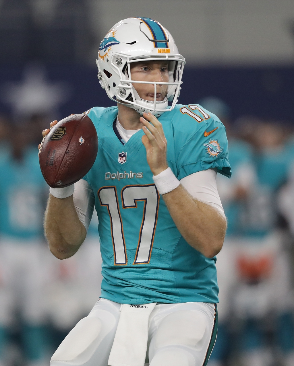 ARLINGTON TX- AUGUST 19 Ryan Tannehill #17 of the Miami Dolphins throws the ball against the Dallas Cowboys in the first quarter of a pre-season game at AT&T Stadium