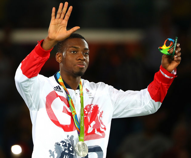 Dean Mouhtaropoulos via Getty Images
Muhammad on the podium