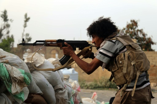 AFP  File  Ahmad Al Basha
A tribesman from the Popular Resistance Committees supporting forces loyal to Yemen's President holds a position in the city of Taez