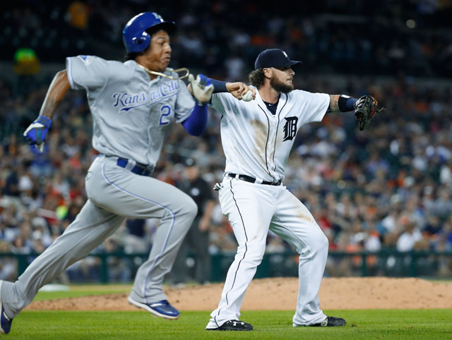 Detroit Tigers first baseman Jarrod Saltalamacchia fields a Kansas City Royals Raul Mondesi bunt single in the sixth inning of a baseball game Monday Aug. 15 2016 in Detroit. Alex Gordon scored on the play