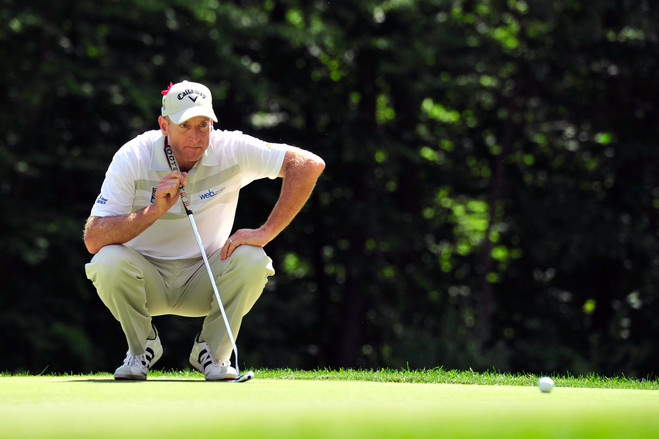 Jim Furyk of the U.S. lines up his put on the 15th green during the final round of the Travelers Championship on Sunday in Cromwell Conn. Furyk shot a record setting 58 on the day