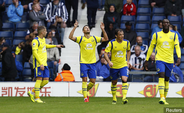 Everton's Kevin Mirallas celebrates scoring their first goal with Gerard Deulofeu Leighton Baines and Romelu Lukaku