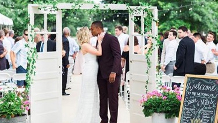 Neighbors come together to throw perfect wedding for high school sweethearts