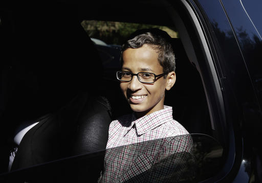 Ahmed Mohamed sits in a vehicle before leaving his family's home in Irving Texas. The family of Ahmed Mohamed who was arrested after a homemade clock he brought to school was mistaken for a bomb filed a