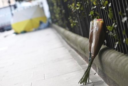 Flowers are left near the scene of a knife attack in Russell Square in London Britain