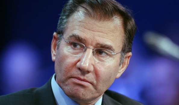 Glencore chief Ivan Glasenberg has welcomed a'solid interim result but lowered the company's net debt target