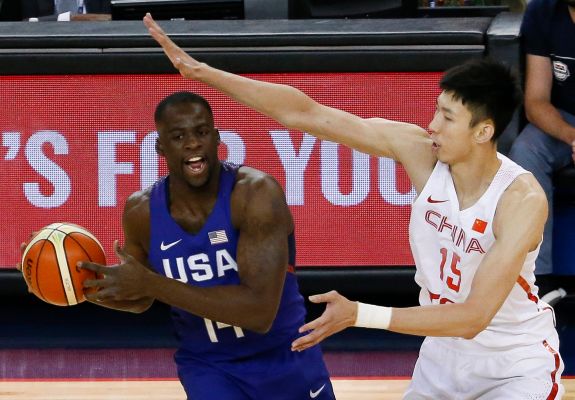 Team USA forward Draymond Green left looks