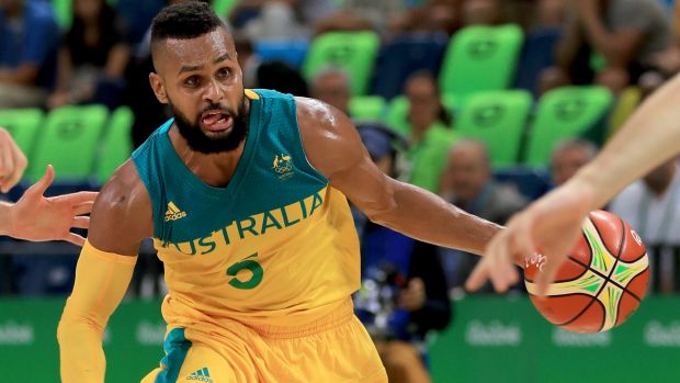 Hot hand Patty Mills was influential against Lithuania