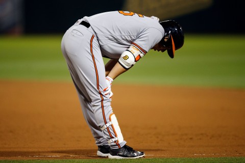 Hyun Soo Kim looks despondent after grounding into a ninth inning double play in Baltimore’s loss to Oakland