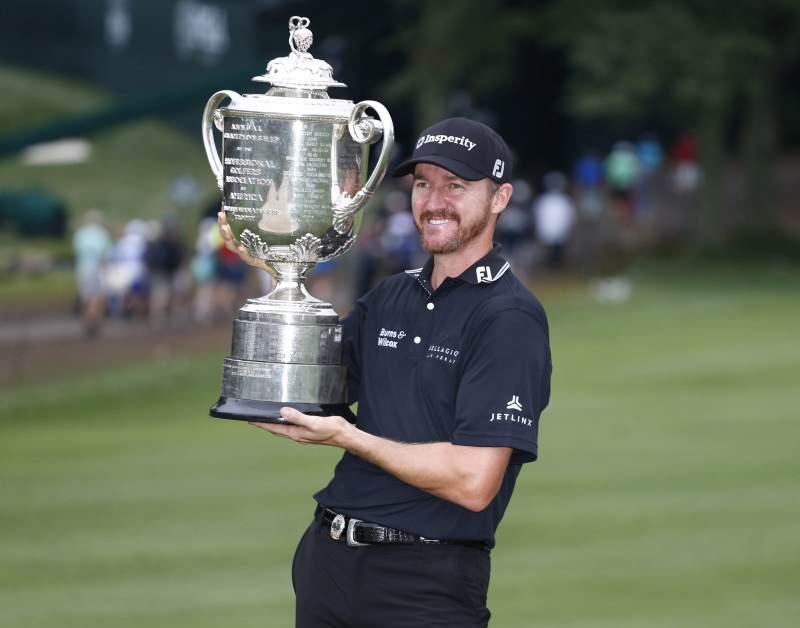 Jimmy Walker with the trophy after winning the PGA Championship