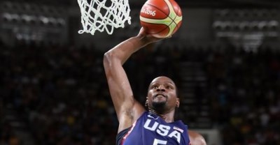 Kevin Durant flies in for a dunk two of his 24 first-half points