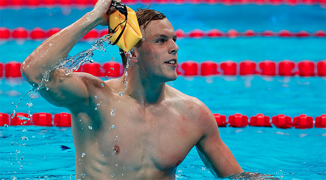 Kyle Chalmers celebrates his first Olympic gold medal