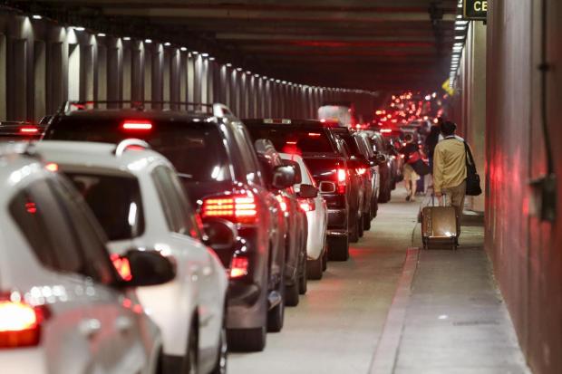 Los Angeles airport: Fears of gunfire spark panicked evacuation of US transport hub