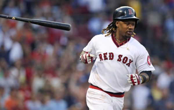 Boston Red Sox's Hanley Ramirez tosses his bat