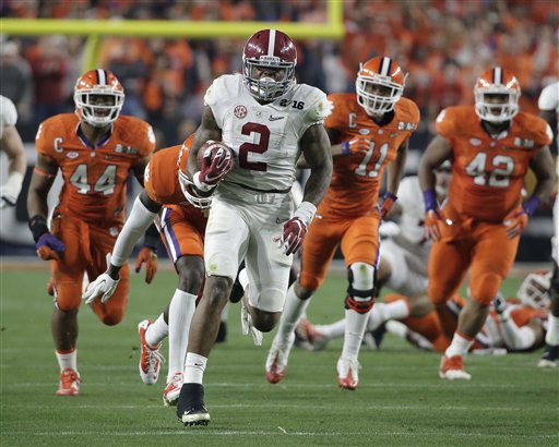 Alabama's Derrick Henry runs for a touchdown during the first half of the NCAA college football playoff championship game Monday Jan. 11 2016 in Glendale Ariz