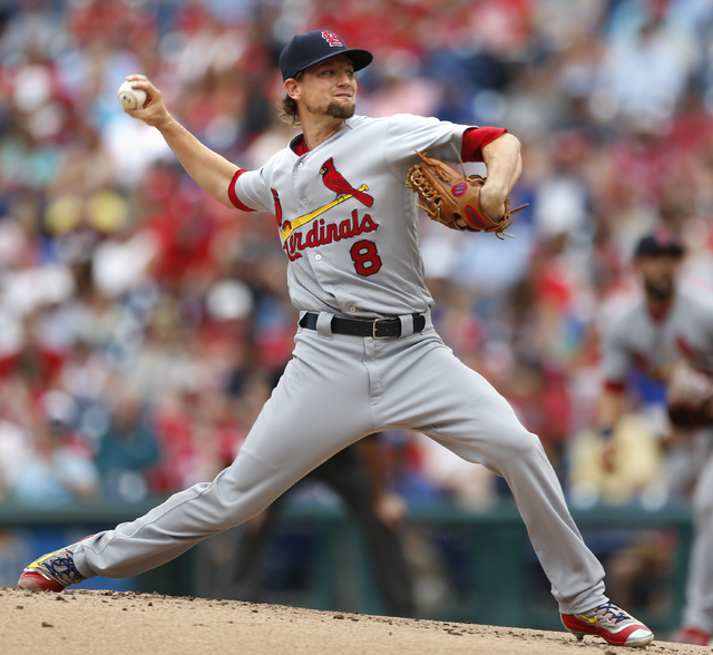 ASSOCIATED PRESS           St. Louis Cardinals starting pitcher Mike Leake throws in the first inning of a baseball game against the Philadelphia Phillies on Sunday