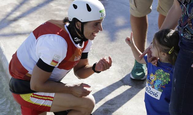 Maialen Chourraut of Spain is told she's number one after winning the gold in the kayak K1 women's canoe slalom at the 2016 Summer Olympics in Rio de Janeiro Brazil Thursday Aug. 11 2016