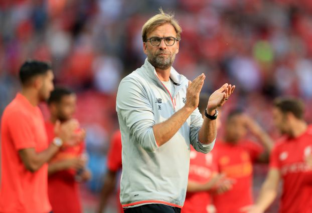 Liverpool boss Jurgen Klopp applauds after his team's Wembley win over Barcelona