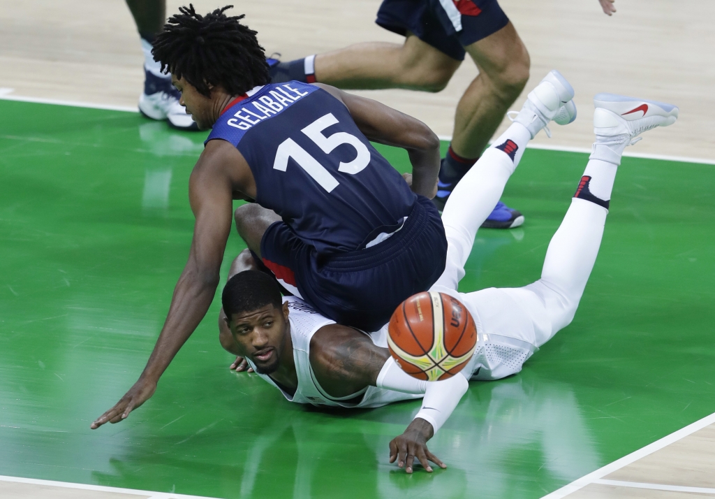 Olympics-Basketball-Spain beat Argentina to end Brazil medal hopes