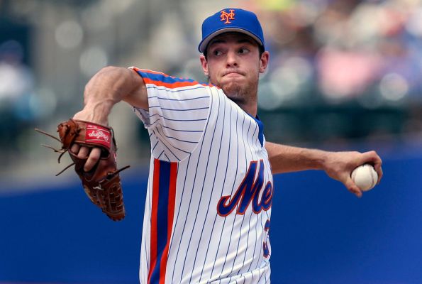 New York Mets starting pitcher Steven Matz throws