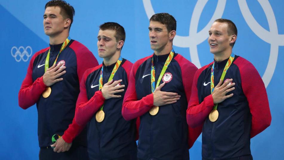 Nathan Adrian Ryan Held Michael Phelps and Caeleb Dressel