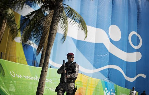 A National Security Force officer patrols outside the beach volleyball arena along Copacabana Beach ahead of the upcoming 2016 Summer Olympics in Rio de Janeiro Brazil Tuesday Aug. 2 2016