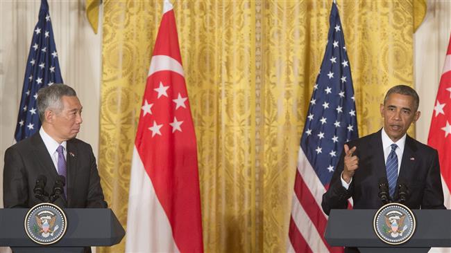 US President Barack Obama and Singapore Prime Minister Lee Hsien Loong hold a joint press conference in the East Room of the White House