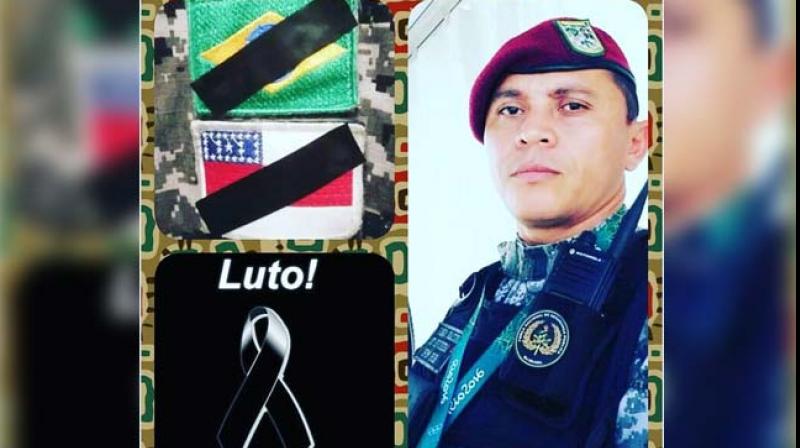 Officer Helio Vieira was shot dead at the Rio's International airport he died on Thursday