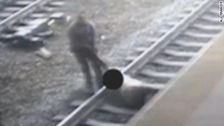 NJ Transit police officer rescues man off tracks moments before train arrives