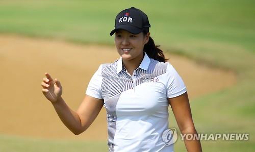 Chun In-gee of South Korea reacts to a bunker shot on the fifth hole during the third round of the Rio de Janeiro Olympic women's golf tournament on Aug. 19 2016