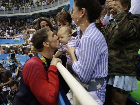 Michael Phelps shares special moment with son after 200 butterfly victory