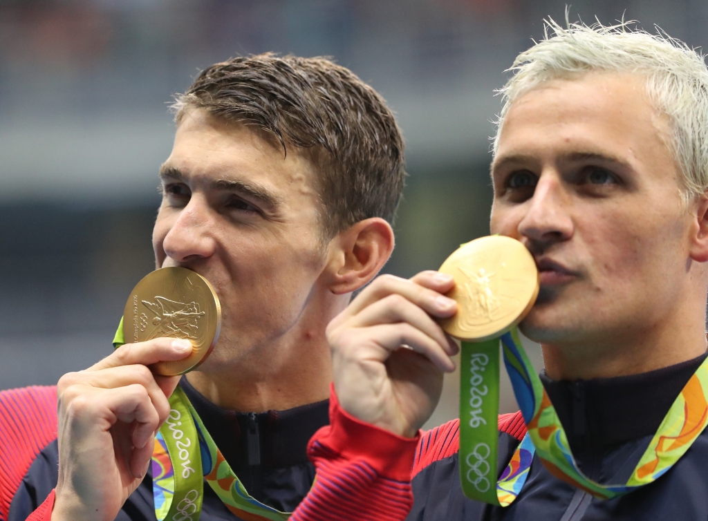 United States&#039 Michael Phelps and Ryan Lochte right celebrate winning the gold medal in the men's 4x200-meter freestyle relay during the swimming competitions at the 2016 Summer Olympics Wednesday Aug. 10 2016 in Rio de Janeiro Brazil. (A