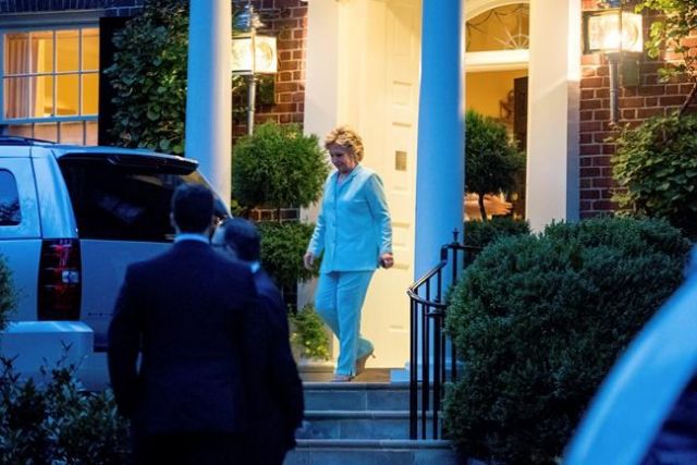 Democratic presidential candidate Hillary Clinton leaves her home in Washington on Friday