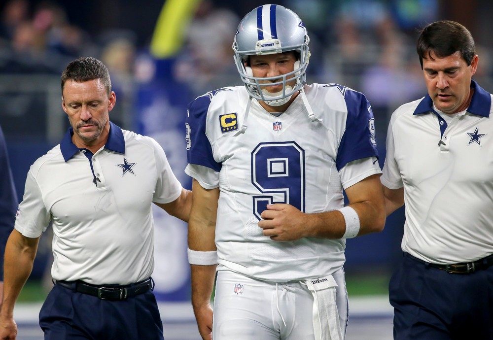 26 NOV 2015 Dallas Cowboys QB Tony Romo comes off the field after an injury during the NFL Thanksgiving game between the Carolina Panthers and the Dallas Cowboys played at AT&T Stadium in Arlington TX. Carolina defeats Dallas 33-14