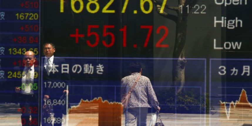 Asian stocks step back from one-year high after Fed rate talks