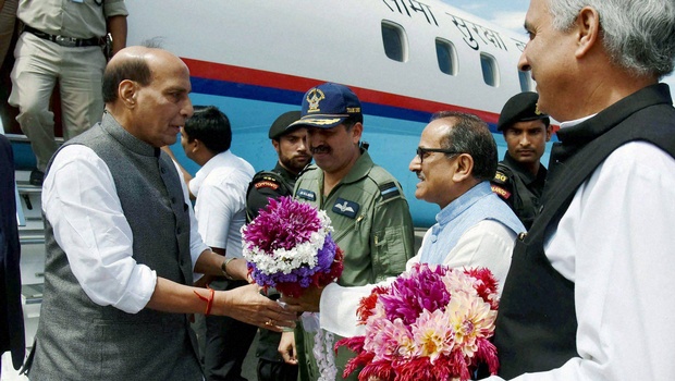 Union Home Minister Rajnath Singh being received by the Deputy Chief Minister of Jammu and Kashmir Nirmal Kumar Singh on his arrival at the airport in Srinagar Jammu and Kashmir on Wednesday. | PTI